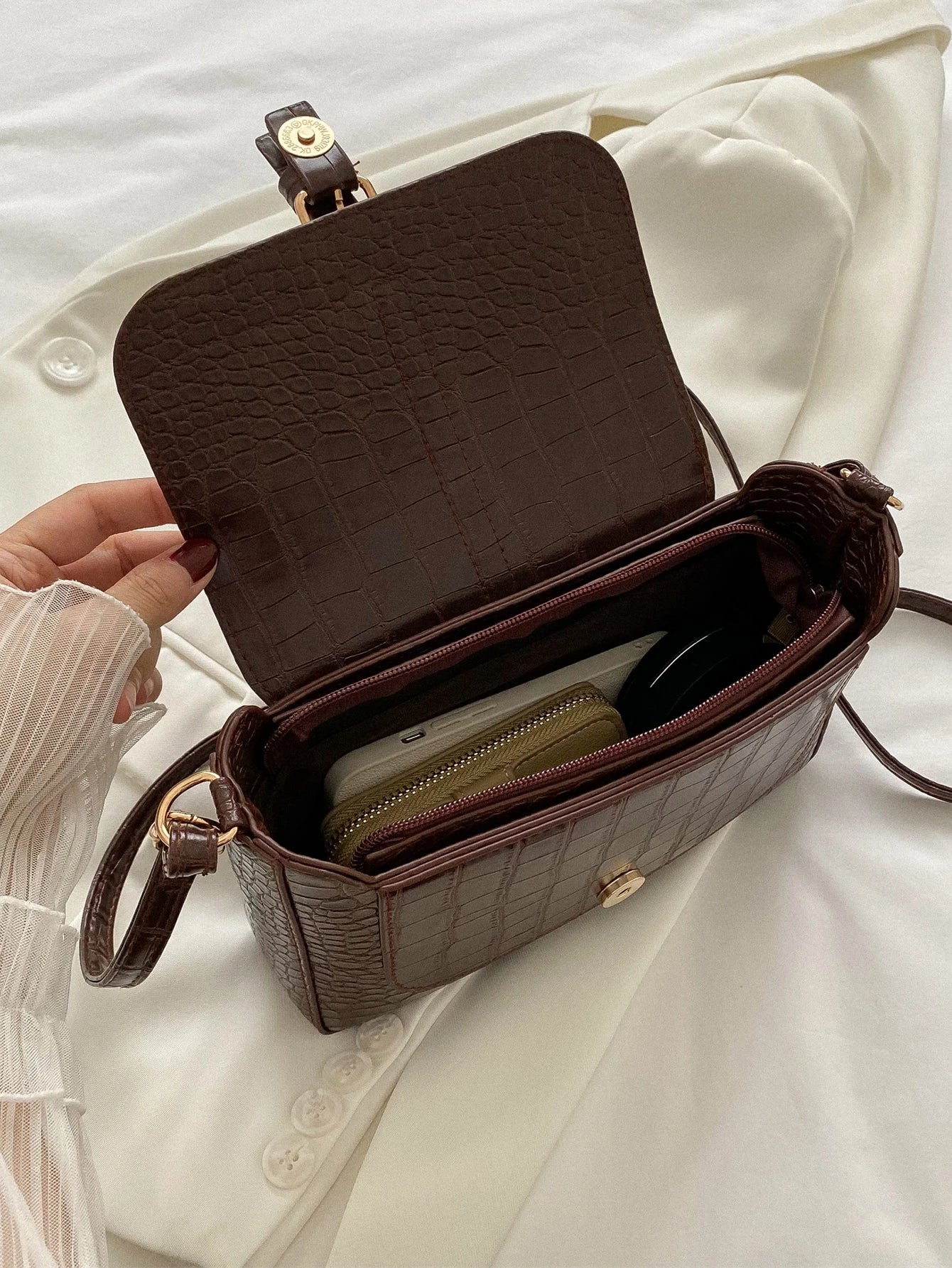Kroppsmønstret crossbodyveske