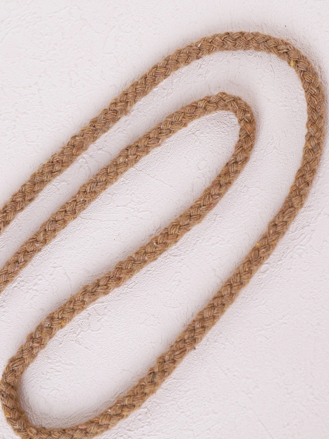 Rund skulderremveske
