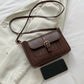 Kroppsmønstret crossbodyveske