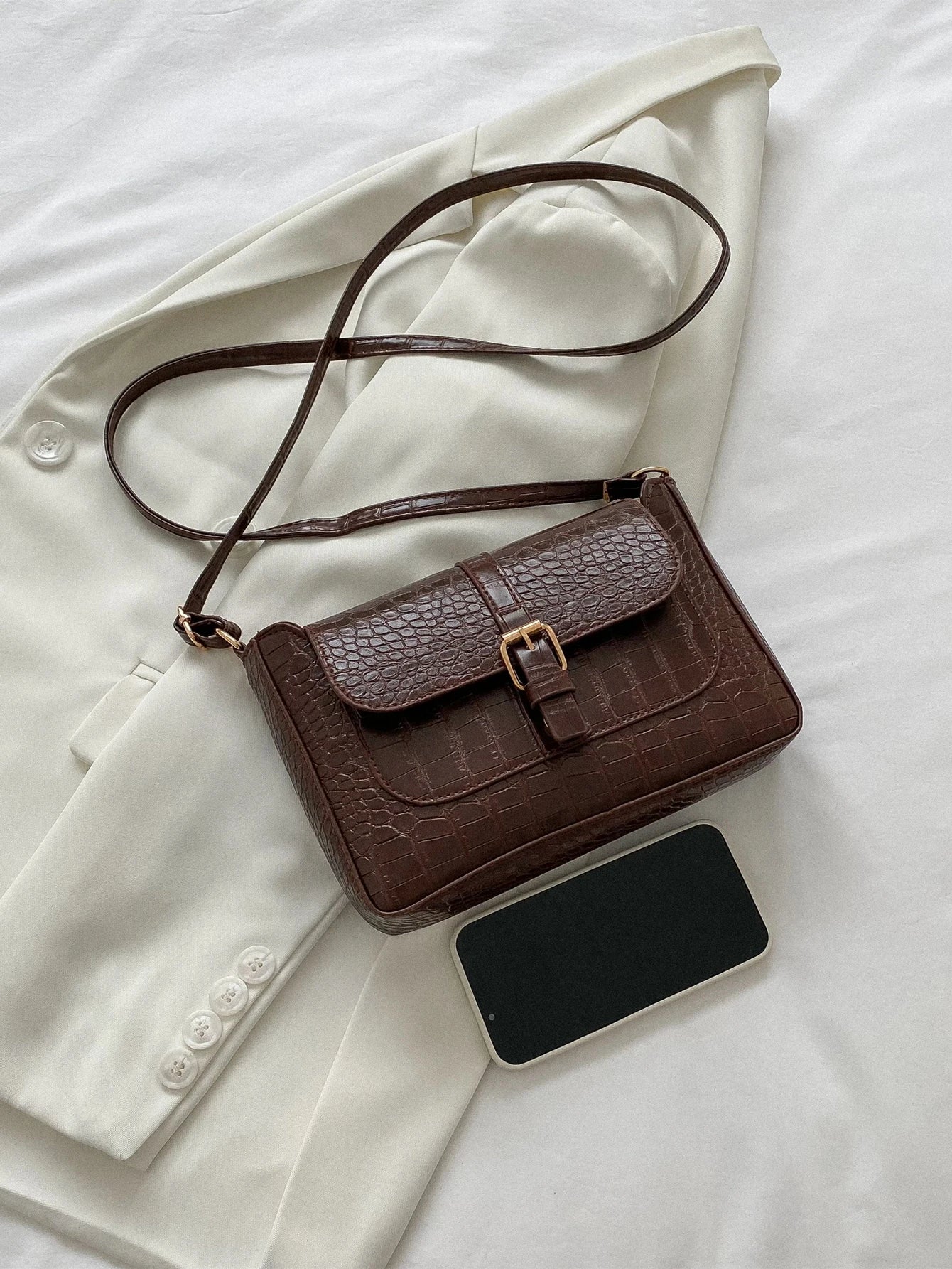 Kroppsmønstret crossbodyveske